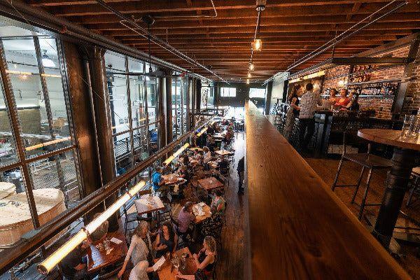 The long bar and dining room at Penny Farthing