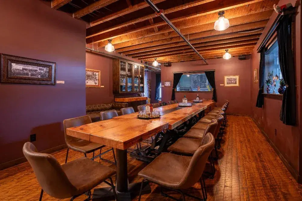 The speakeasy set with a long wooden table