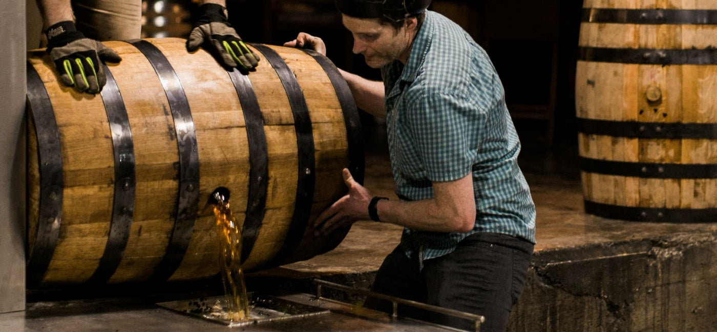 Emptying a bourbon barrel