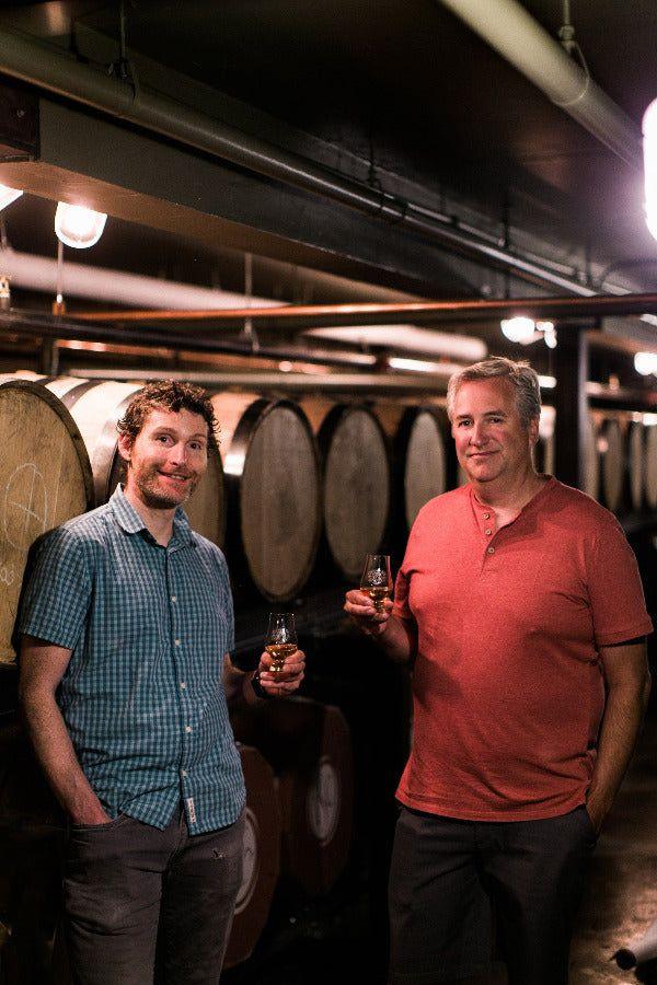 Co-owners Matt Howell and Kelly Andrews in the barrel room